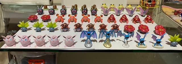 Venonat, Venomoth, Vileplume, Gloom +7 · Monster Collection · clear/translucent Zubat variants
