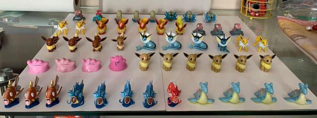 Porygon, Jolteon, Flareon, Vaporeon +5 · Monster Collection · red/shiny Gyarados present alongside blue Gyarados