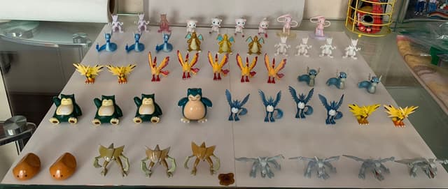 Mewtwo, Mew, Dragonair, Dragonite +8 · Monster Collection · tan/alt-color Snorlax variant